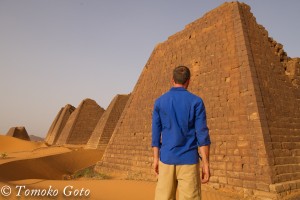 The pyramids of Meroe in blue and sand brown.