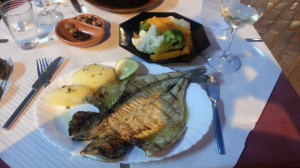 A lovely buttery dinner of grilled golden bream at a riverside place in Tavira...