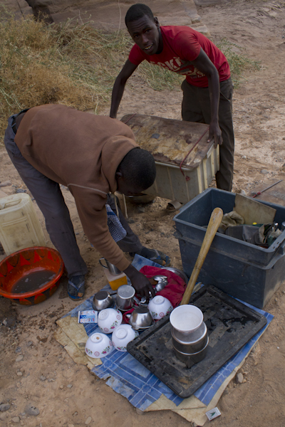 Jonathan prepares lunch after a resupply in Faya...